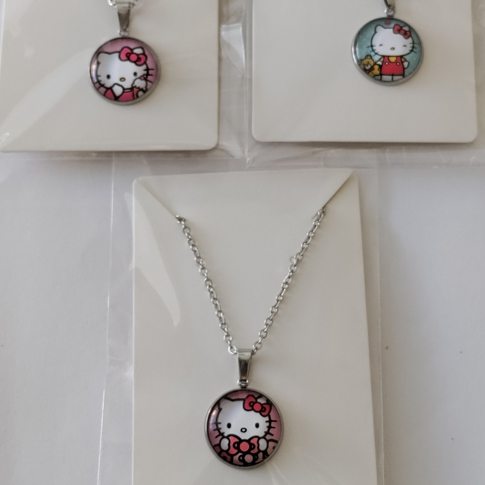 3 Hello Kitty Round glass cabochon Necklaces